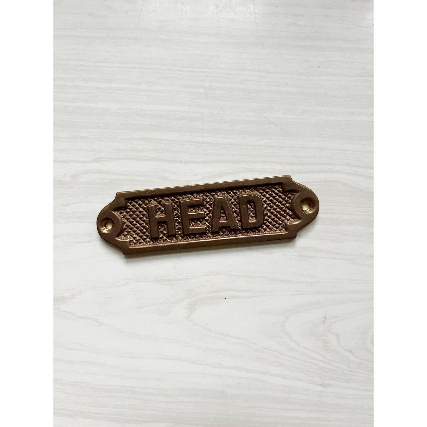 Brass "Head" Sign
