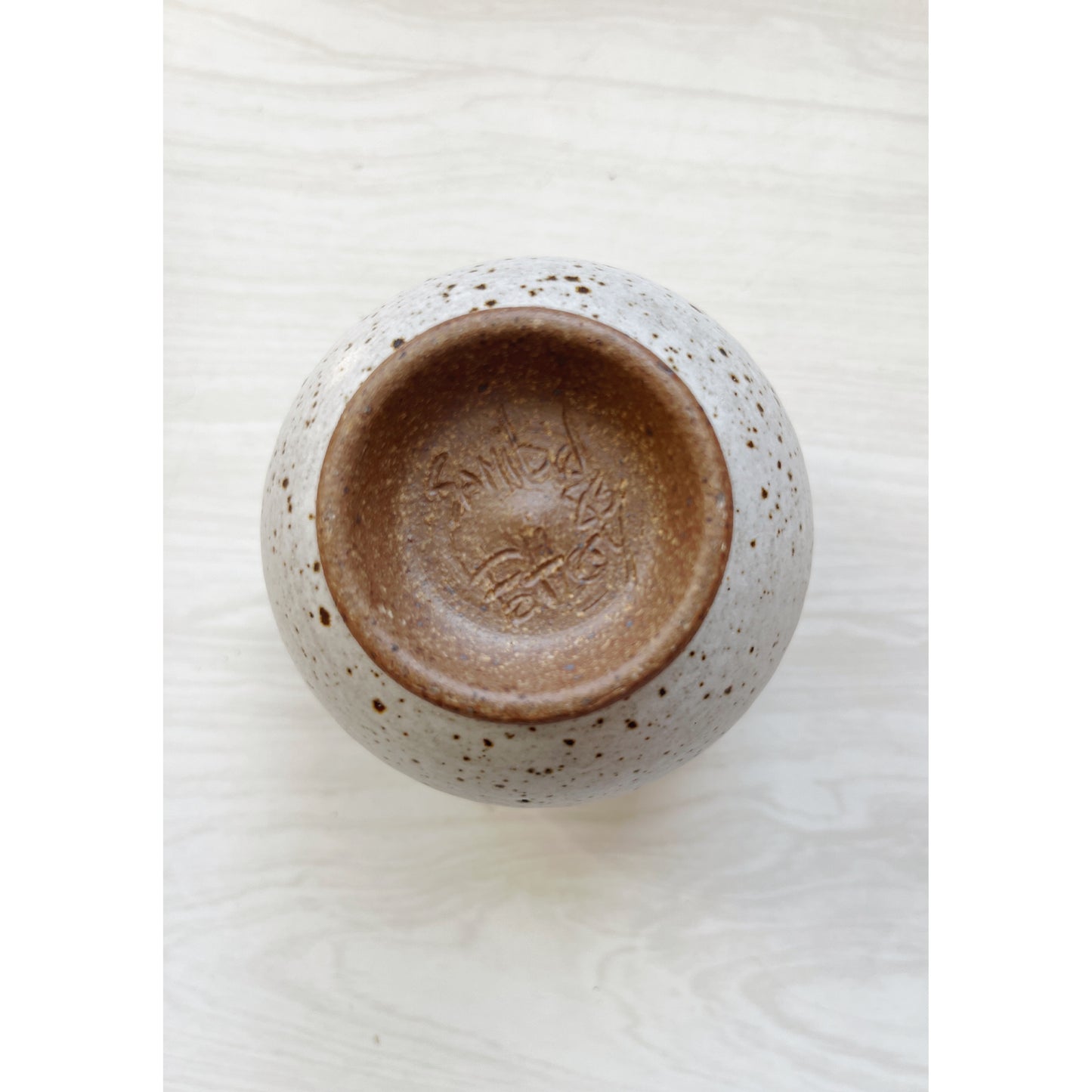 Speckled Pottery Vessel